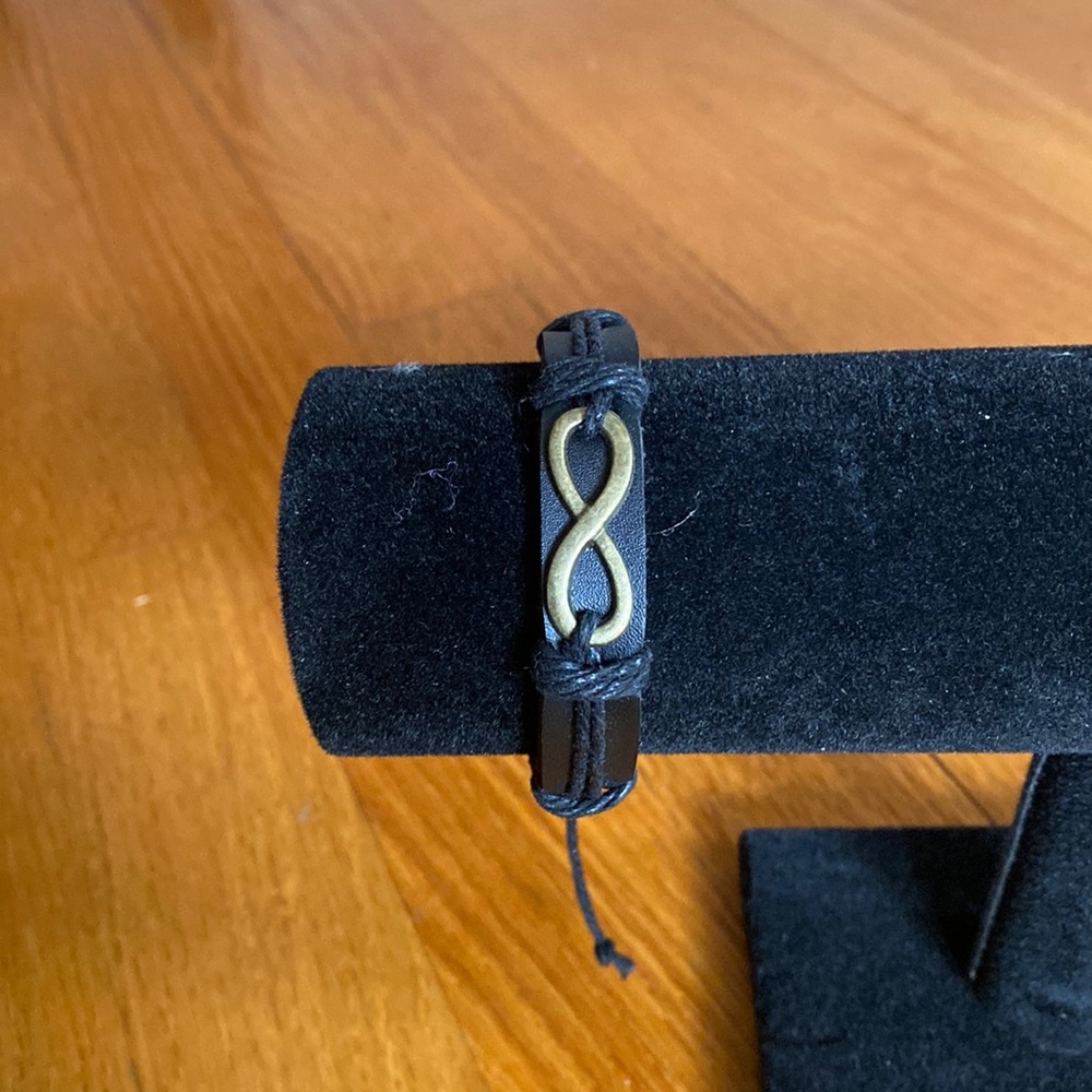 NWOT Leather bracelet with Infinity charm